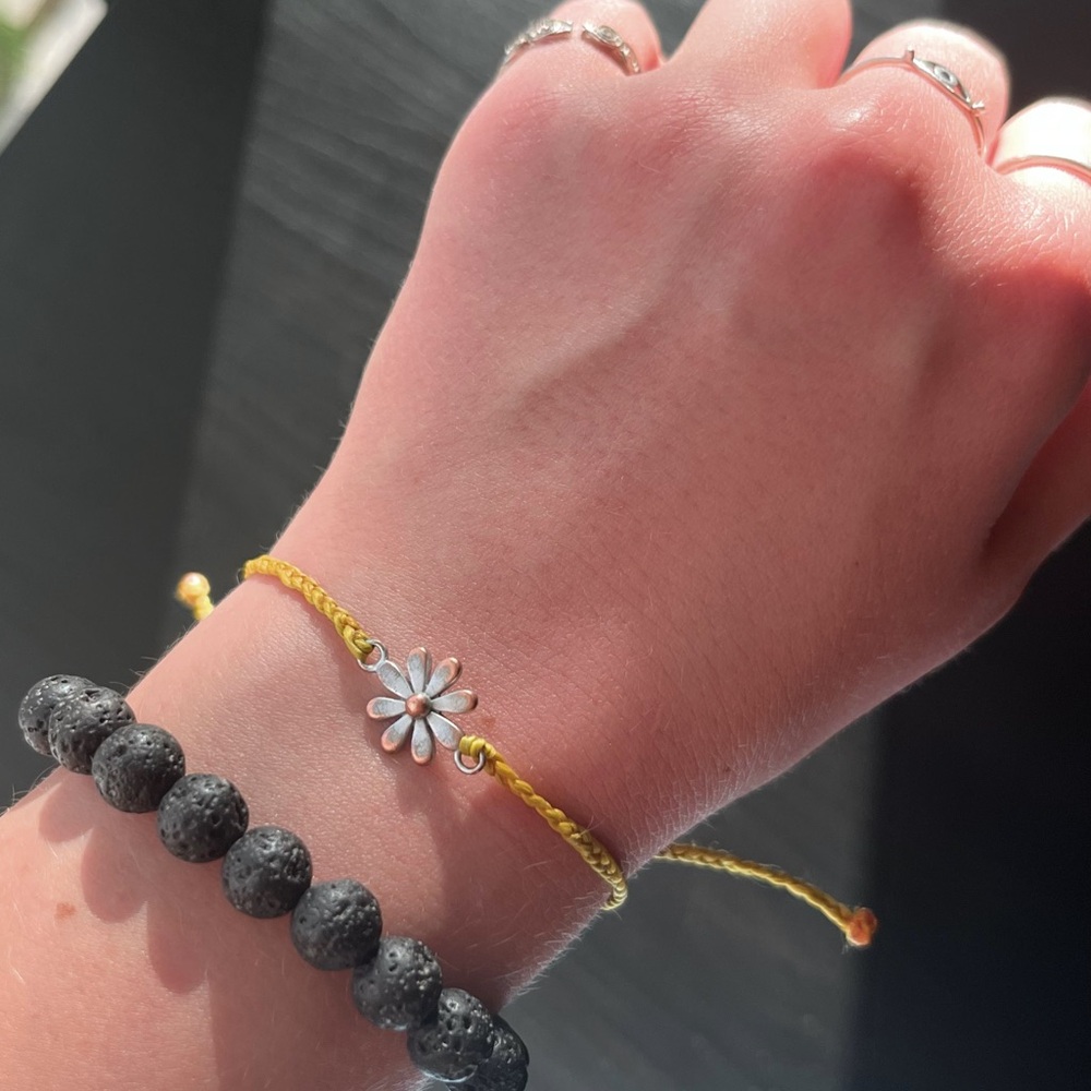 Yellow adjustable PuraVida bracelet with sun charm